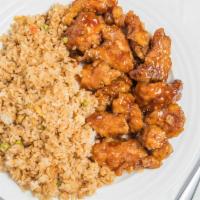 Sesame Chicken · Crispy tried white meat chicken, coated with honey sesame seed.