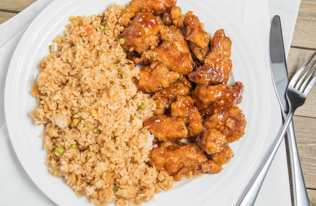 Sesame Chicken · Crispy tried white meat chicken, coated with honey sesame seed.