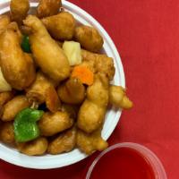 Sweet & Sour Chicken · Lightly fried chicken with sliced carrots, bell pepper and pineapple in sweet and sour sauce.
