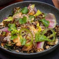 Crispy Brussels Sprouts · Salsa Macha, Manchego cheese, Marcona almond.