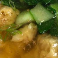 Wonton Soup · Home-made Chinese dumplings with minced pork filling in soup.