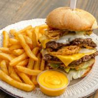 Heart Attack Burger · Starts off with fresh burger patty, topped with deep fried pickles chips,fried onion straws,...