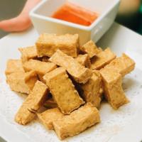 Crispy Tofu  · Tofu fried to crispy perfection with house special marinated sauce. Served with our house sw...