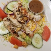 Garden Salad · Iceberg topped with mixed cheese, tomato, cucumber, onions and croutons. Add chicken, steak ...