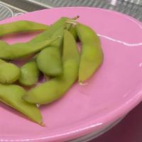 Edamame · Steamed soy beans with salt on top.