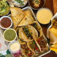 The Mini Mockingbird Platter (Feeds 3 - 4) · serves 3-4 people
6 TACOS
• 3 tacos each of your choice
of any 2 varieties
1 QUESADILLA
• Sh...