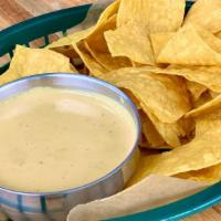 Queso (Regular) · Made with  Monterey Jack cheese and jalapeno puree. Vegetarian and gluten free
