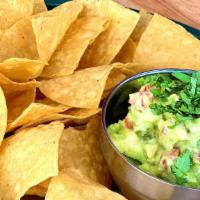 Guacamole · Fresh, made to order with mashed avocado, diced tomatoes, onions, bell peppers, cilantro, an...