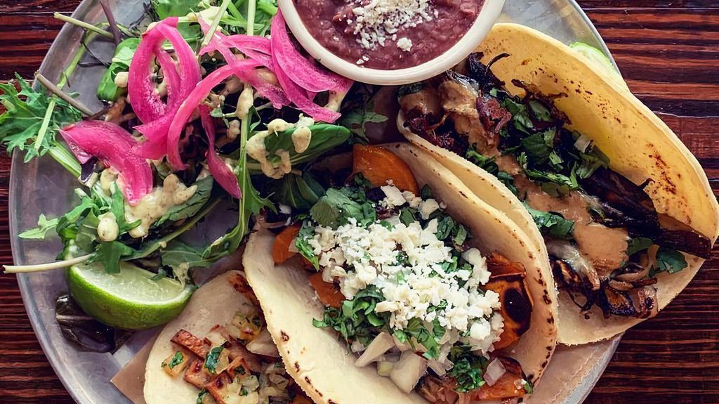 3 Taco Plate · Plates served with your choice of 2:
black beans, cilantro rice, side salad, pickled vegetables
