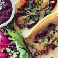 2 Taco Plate · Plates served with your choice of 2:
black beans, cilantro rice, side salad, pickled vegetab...