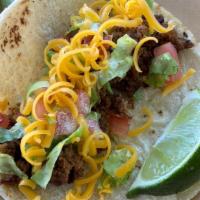Beef Supreme Taco · Seasoned ground beef, lettuce, cheddar, tomato and chimichurri ranch