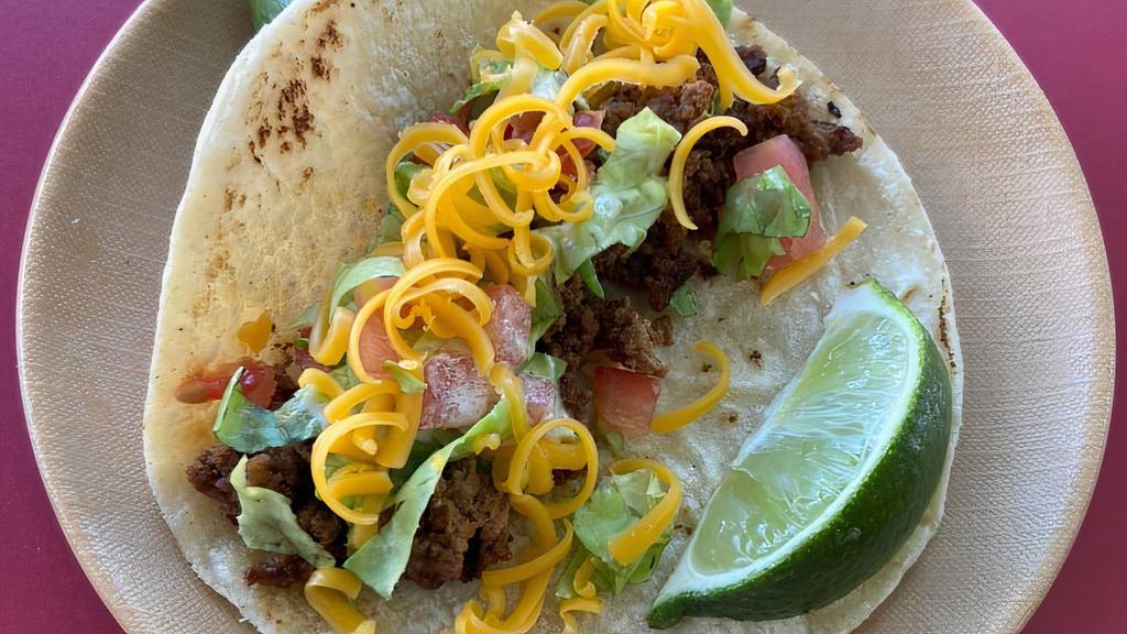 Beef Supreme Taco · Seasoned ground beef, lettuce, cheddar, tomato and chimichurri ranch