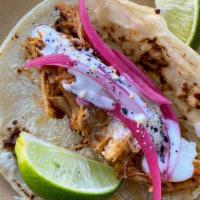 Red Chile Chicken Taco · slow cooked chicken with pickled red onion, buttermilk yogurt and everything bagel spice