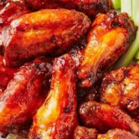 A 11. Fried Chicken Wings · Cooked wing of a chicken coated in sauce or seasoning.