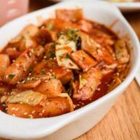Thuk Poki - Spicy Rice Cakes · Stir fried rice cake in homemade spicy gochujang sauce.
