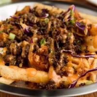 Kimchi Fries · Fries topped with grilled kimchi and sauce