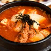 Kimchi Jigae - Kimchi Stew · Spicy kimchi stew with tofu, vegetables and pork.