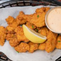 Fried Gator Bites  · Buttermilk soaked gator filet breaded and fried to perfection & dusted with house cajun seas...