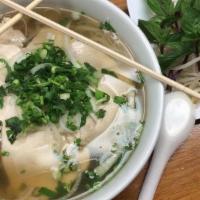 Pho Chicken · Served with beef soup and rice noodles. topped with onions scallions and cilantro.