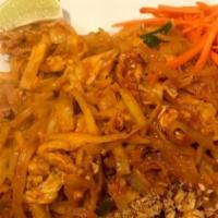 Chicken Pad Thai · Thin rice noodles stirred in sweet and tangy pad thai sauce with eggs ground peanut bean spr...
