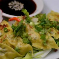 #12. Pot Sticker · Fried or steamed. A Thai house appetizer favorite. Delicious dumplings stuffed with spinach ...