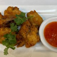 #8. Thai House Wings (6) · Deep-fried sweet and spicy chicken wings served with the spicy tamarind sauce.
