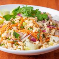 #23. Larb Salad · Choice of minced chicken, pork, or beef seasoned with lime juice, chili peppers, cilantro, r...