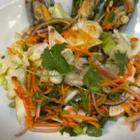 #26. Yum Seafood Salad · Steamed shrimp, squid, crab meat and scallop seasoned with chili pepper, cilantro, carrot, r...
