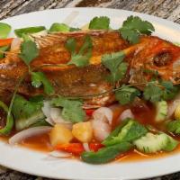 #35. Pla Preowarn · Choice of fish with onion, bell pepper, tomato, baby corn, pineapples and cucumber in sweet ...