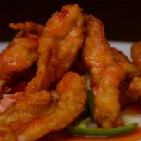 #55. Thai Sweet And Sour · Deep fried choice of meat with cucumber, tomato, bell pepper, onion and pineapple in our Tha...