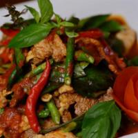 #51. Pad 3 King · Combination of chicken, pork and beef sauteed with red curry sauce, green bean, basil and be...
