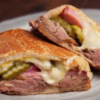 Cuban Sandwich · roasted pulled pork shoulder, ham,. mustard, mayo, swiss cheese & pickles. on a crusty toast...
