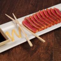 *Blackened Seared Ahi Tuna Appetizer · served with pickled ginger, soy sauce & wasabi, garnished with toasted sesame seeds