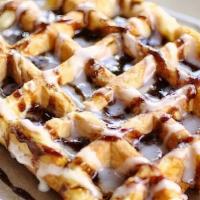 Cinnamon Roll Waffle · Sweet cinnamon glaze and house-made icing on our golden Liege waffle.