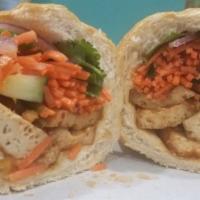 Lemongrass Tofu · Dressed with butter aioli, cucumber, pickled carrots, cilantro, jalapeños, onions, and soy s...