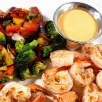 Grilled Shrimp & Sriracha Mayo Salad · Everything on a garden salad with grilled shrimp and homemade sriracha mayo.