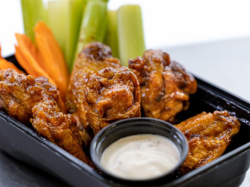 10 Piece Wing · 10 Wings tossed in your choice 1 of our sauces or dry rubs. Served with your choice of ranch or bleu cheese.