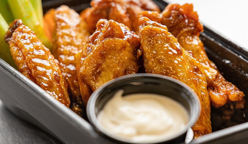 20 Piece Wing
 · 20 Wings tossed and your choice 1 or 2 of our sauces or dry rubs. Served with your choice of ranch or bleu cheese