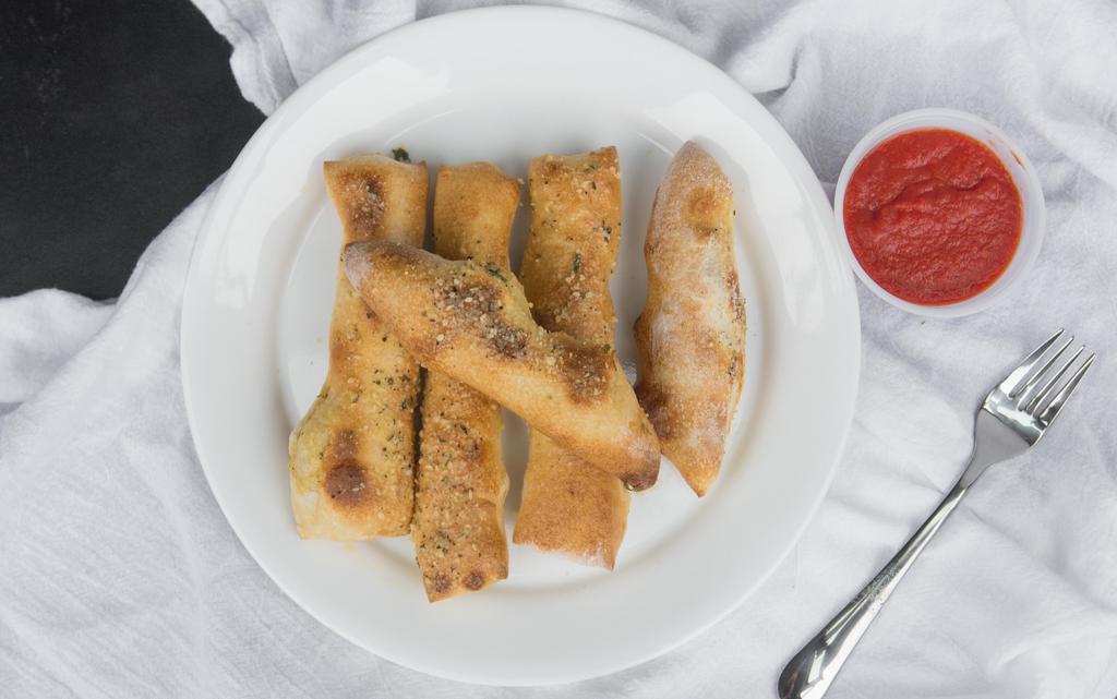 Bread Sticks (Small) · Fresh baked breadsticks served with choice of marinara or cheese sauce. 610 cal.