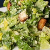 Caesar Salad · Fresh romaine, reggiano, sourdough croutons. Add shrimp or chicken for an additional charge.