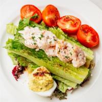 Gulf Shrimp Remoulade Salad · romaine heart, Campari tomatoes, deviled egg, and a 
New Orleans style remoulade