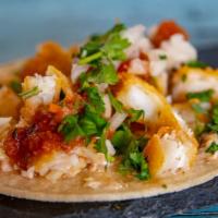 Baja Style Fish Taco · Lightly battered white fish, made 