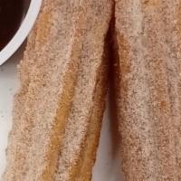 Strawberry Filled Churros  · 10 in  Strawberry filled Churros with cinnamon sugar mixture. You can add your favorite topp...