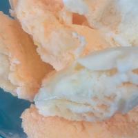 Orange Swirl Ice Cream · A refreshing swirl of orange sherbet and vanilla ice cream.