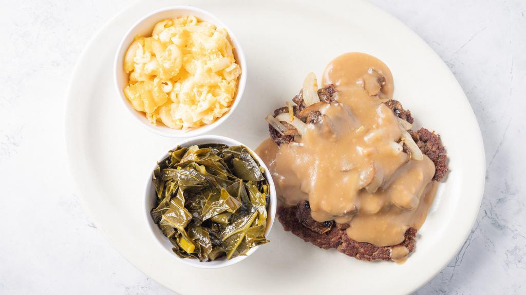 Hamburger Steak · 8 oz of Angus beef topped with grilled onions,mushrooms and our homemade gravy served with a biscuit and two sides.