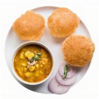 Poori With Potato Bhaji - 2 Pieces(V) · Deep-fried pooris made with whole wheat flour and served with spiced Potato Curry.