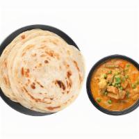 Parotta With Curry - 2 Pieces(V) · Layered and flaky flatbread originating from Kerala, served with a side of Curry.