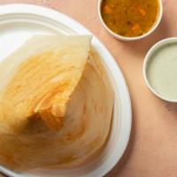 Dosa (V) · A traditional South Indian thin and crispy crepe made with rice and lentil batter