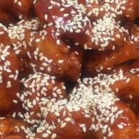 Sesame Chicken · With sesame in chef's special sauce.