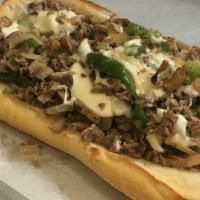 Philly Steak · with Green Peppers, Onions, Mushrooms & Cheese